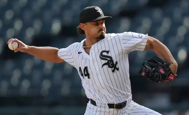 Chicago White Sox pitcher Jordan Hicks (44) throws against the Baltimore Orioles during the seventh inning of a baseball game, Tuesday, April 7, 2026, in Chicago. (AP Photo/Erin Hooley)