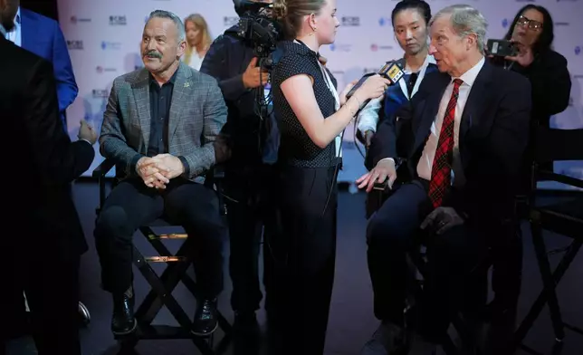 Chad Bianco, left, and Tom Steyer speak with members of the media following a California gubernatorial debate hosted by CBS LA at Pomona College in Claremont, Calif., Tuesday, April 28, 2026. (AP Photo/Jae C. Hong)