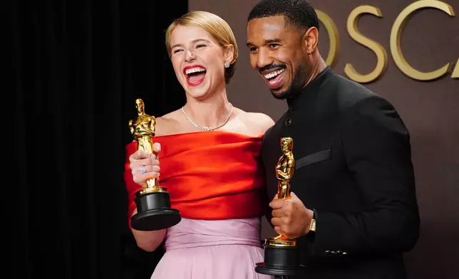 FILE- Jessie Buckley, left, winner of the award for best actress in a leading role for "Hamnet," and Michael B. Jordan, winner of the award for best actor in a leading role for "Sinners," pose in the press room at the Oscars. March 15, 2026, at the Dolby Theatre in Los Angeles. (Photo by Jordan Strauss/Invision/AP, File))