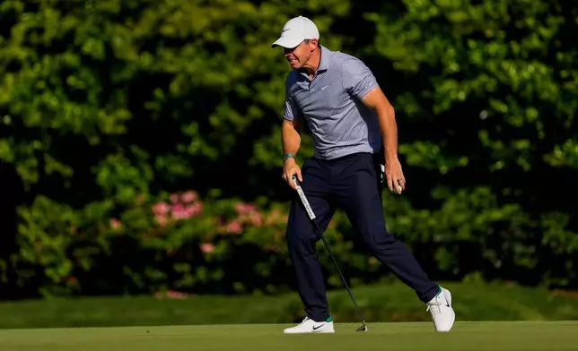 Rory McIlroy, of Northern Ireland, reacts after missing a putt on the 11th hole during the third round of the Masters golf tournament at the Augusta National Golf Club, Saturday, April 11, 2026, in Augusta, Ga. (AP Photo/Gerald Herbert)