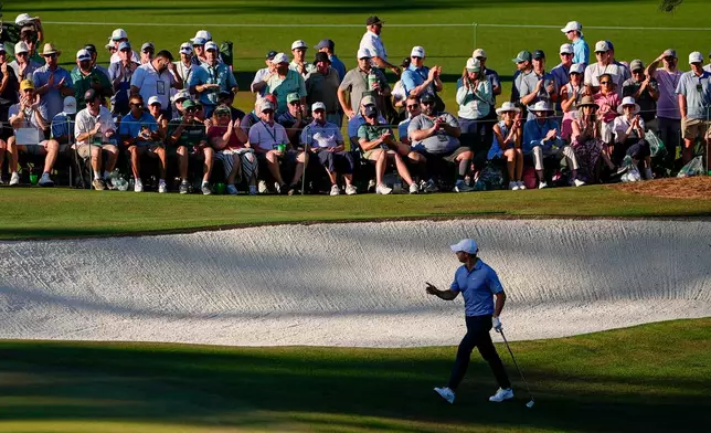 Rory McIlroy, of Northern Ireland, walks to green on the 15th hole during the third round of the Masters golf tournament at the Augusta National Golf Club, Saturday, April 11, 2026, in Augusta, Ga. (AP Photo/Eric Gay)