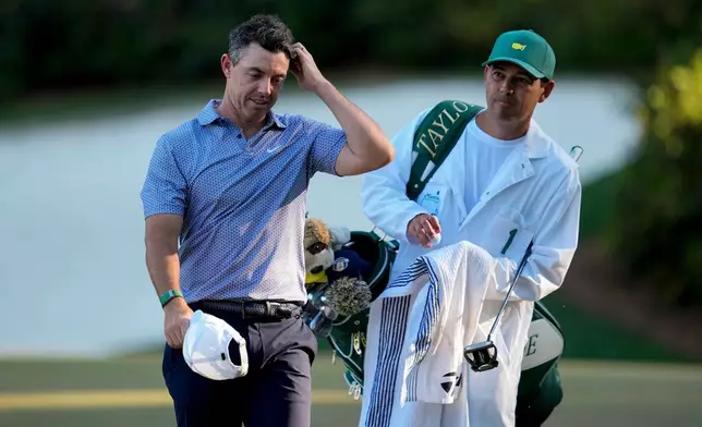 Rory McIlroy, of Northern Ireland, walks to the tee on the 14th hole during the third round of the Masters golf tournament at the Augusta National Golf Club, Saturday, April 11, 2026, in Augusta, Ga. (AP Photo/Ashley Landis)
