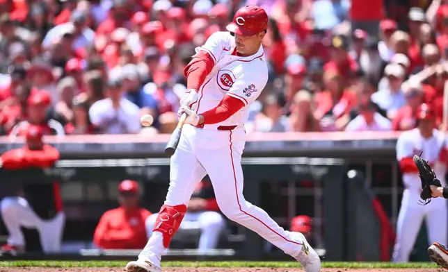 Cincinnati Reds' Nathaniel Lowe hits a solo home run during the second inning of a baseball game against the Detroit Tigers in Cincinnati, Sunday, April 26, 2026. (AP Photo/Ben Jackson)