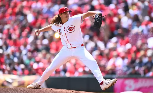 Cincinnati Reds pitcher Rhett Lowder throws during the first inning of a baseball game against the Detroit Tigers in Cincinnati, Sunday, April 26, 2026. (AP Photo/Ben Jackson)