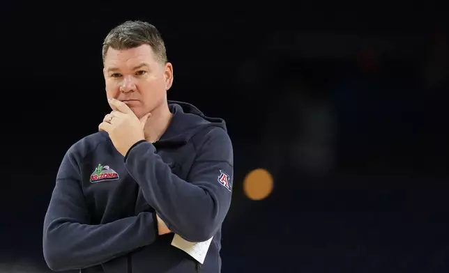 Arizona head coach Tommy Lloyd watches during practice ahead of an NCAA college basketball tournament semifinal game against against Michigan at the Final Four, Friday, April 3, 2026, in Indianapolis. (AP Photo/Michael Conroy)
