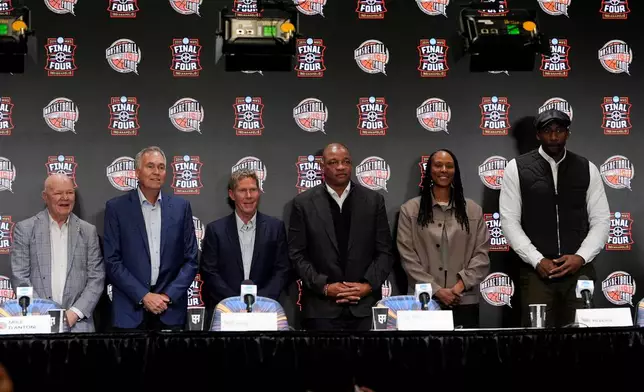 Naismith Hall of Fame Class of 2026 inductees from left; Joey Crawford, Mike D'Antoni, Mark Few, Doc Rivers, Chamique Holdsclaw, and Amar'e Stoudemire are introduced during a news conference at the Final Four of the NCAA college basketball tournament, Saturday, April 4, 2026, in Indianapolis. (AP Photo/Michael Conroy)