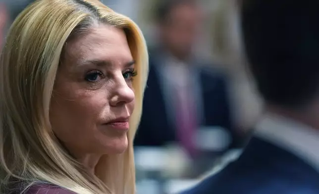 Attorney General Pam Bondi listens during a Cabinet meeting at the White House, Thursday, March 26, 2026, in Washington. (AP Photo/Alex Brandon)