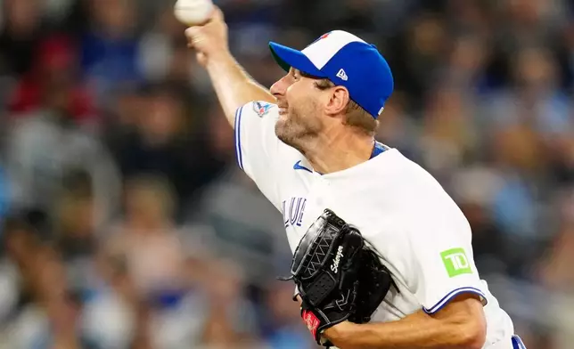 Toronto Blue Jays pitcher Max Scherzer works against the Los Angeles Dodgers during first-inning baseball game action in Toronto on Monday, April 6, 2026. (Frank Gunn/The Canadian Press via AP)