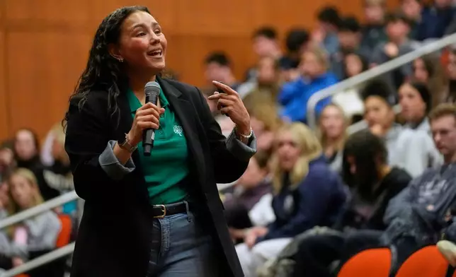 Keely Rogers, a trainer with Sandy Hook Promise's "Say Something" program, gives a presentation on preventing school shootings at Hanover High School, Wednesday, March 25, 2026, in Hanover, Mass. (AP Photo/Robert F. Bukaty)