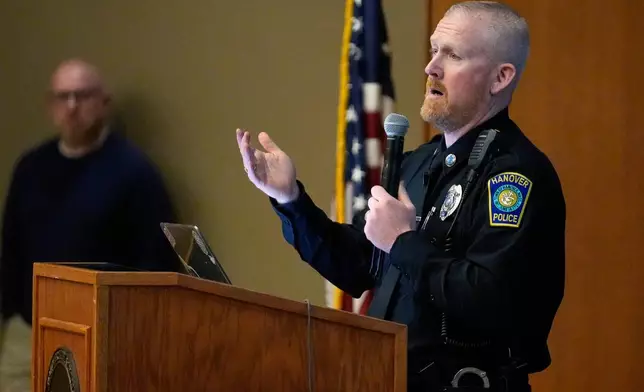 School Resource Officer John Voelkel speaks about ways to prevent school shootings during a presentation of Sandy Hook Promise's "Say Something" program at Hanover High School, Wednesday, March 25, 2026, in Hanover, Mass. (AP Photo/Robert F. Bukaty)