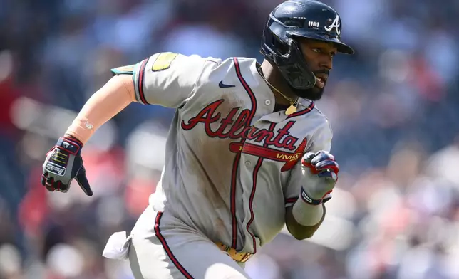 Atlanta Braves' Michael Harris II runs the bases after hitting a one-run double during the seventh inning of a baseball game against the Washington Nationals, Thursday, April 23, 2026, in Washington. (AP Photo/Nick Wass)