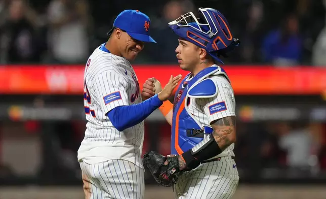 New York Mets' Juan Sot, left, celebrates with Francisco Alvarez after a baseball game against the Minnesota Twins Wednesday, April 22, 2026, in New York. (AP Photo/Frank Franklin II)