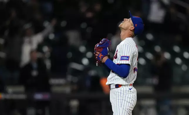 New York Mets pitcher Luke Weaver reacts after a baseball game against the Minnesota Twins Wednesday, April 22, 2026, in New York. (AP Photo/Frank Franklin II)