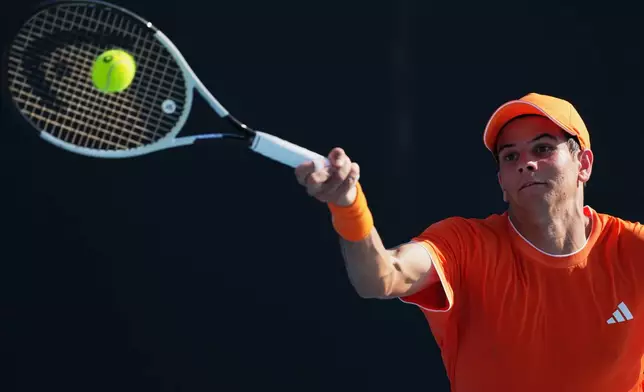 FILE - Rafael Jodar of Spain plays a forehand return to Rei Sakamoto of Japan during their first round match at the Australian Open tennis championship in Melbourne, Australia, Tuesday, Jan. 20, 2026. (AP Photo/Dar Yasin,File)