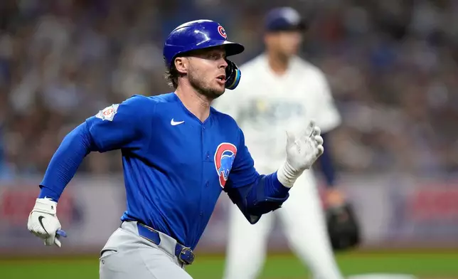 Chicago Cubs' Nico Hoerner runs the bases after his RBI double off Tampa Bay Rays pitcher Joe Boyle during the fifth inning of a baseball game Wednesday, April 8, 2026, in St. Petersburg, Fla. (AP Photo/Chris O'Meara)
