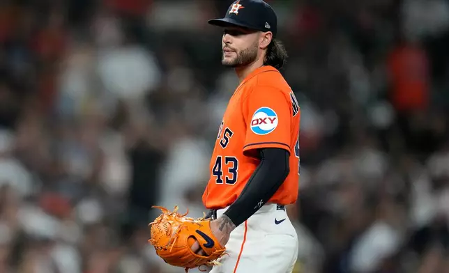 Houston Astros starting pitcher Lance McCullers Jr. reacts after giving up a home run to New York Yankees' Jazz Chisholm Jr. during the fourth inning of a baseball game, Friday, April 24, 2026, in Houston. (AP Photo/ Karen Warren)