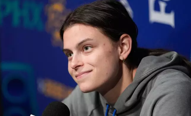 UCLA forward Gabriela Jaquez (11) speaks during a news conference at the NCAA college basketball tournament Final Four, Saturday, April 4, 2026, in Phoenix. (AP Photo/John Locher)