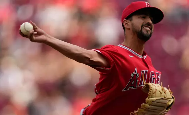 Los Angeles Angels pitcher Nick Sandlin throws during the eighth inning of a baseball game against the Cincinnati Reds in Cincinnati, Sunday, April 12, 2026. (AP Photo/Carolyn Kaster)