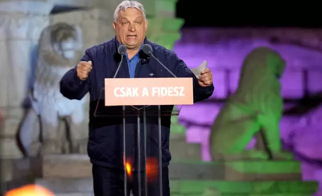 Hungary's Prime Minister Viktor Orban addresses supporters during the electoral campaign closing rally of the governing Fidesz in Budapest, Hungary, Saturday, April 11, 2026. (AP Photo/Petr David Josek)