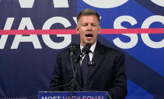 Peter Magyar, the leader of the opposition Tisza party attends a rally in Debrecen, Hungary, Saturday, April 11, 2026. (AP Photo/Darko Bandic)