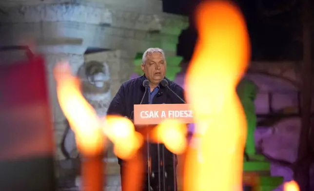 Hungary's Prime Minister Viktor Orban addresses supporters during the electoral campaign closing rally of the governing Fidesz in Budapest, Hungary, Saturday, April 11, 2026. (AP Photo/Petr David Josek)