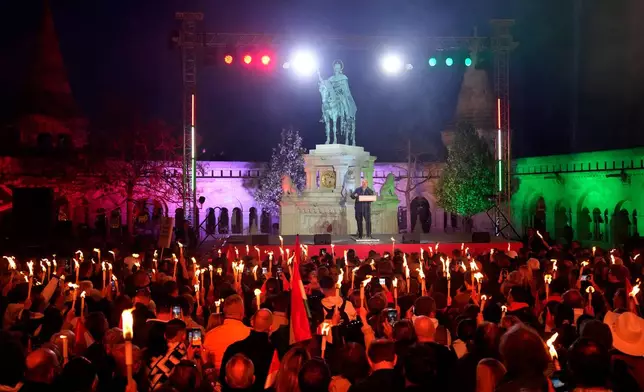 Hungary's Prime Minister Viktor Orban addresses supporters during the electoral campaign closing rally of the governing Fidesz in Budapest, Hungary, Saturday, April 11, 2026. (AP Photo/Petr David Josek)