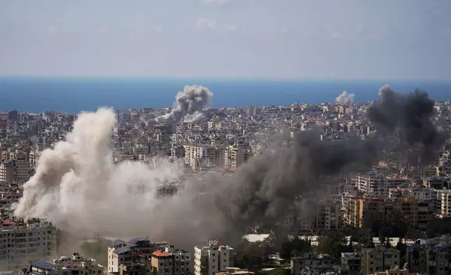 Smoke rises following several Israeli airstrikes in Beirut, Lebanon, Wednesday, April 8, 2026. (AP Photo/Hassan Ammar)