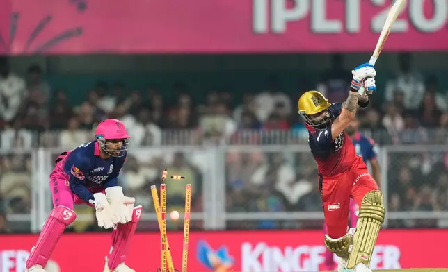 Royal Challengers Bengaluru's Virat Kohli bowled out during the Indian Premier League cricket match between Royal Challengers Bengaluru and Rajasthan Royals in Guwahati, India, Friday, April 10, 2026. (AP Photo/Anupam Nath)