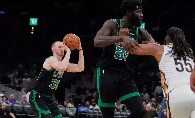 Boston Celtics forward Sam Hauser (30) takes a 3-point shot against the New Orleans Pelicans during the second half of an NBA basketball game, Friday, April 10, 2026, in Boston. (AP Photo/Charles Krupa)