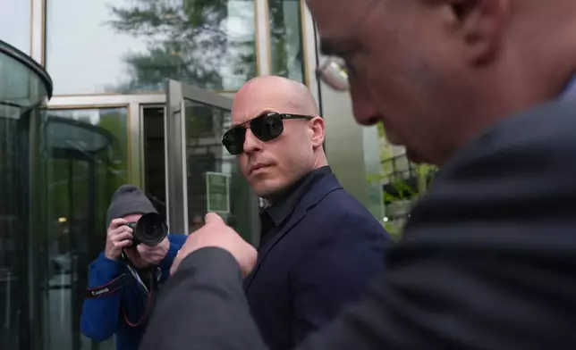 Gannon Ken Van Dyke walks outside a federal courthouse in New York on Tuesday, April 28, 2026. (AP Photo/Ryan Murphy)