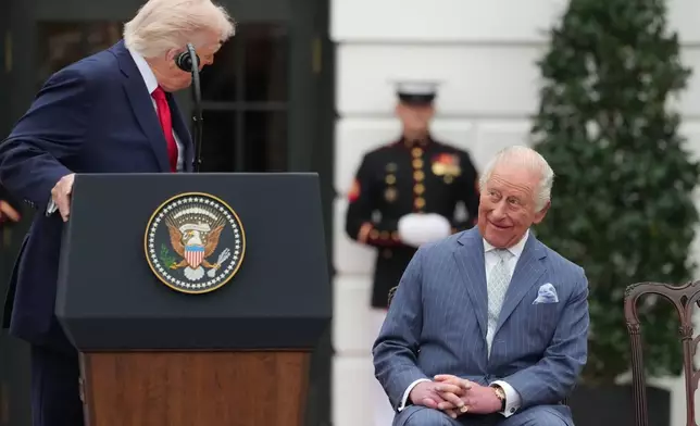 Britain's King Charles III listens as President Donald Trump speaks during a State Visit arrival ceremony on the South Lawn of the White House, Tuesday, April 28, 2026, in Washington. (AP Photo/Alex Brandon)