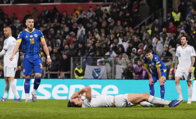 Italy's Pio Esposito reacts during the World Cup qualifying playoff final soccer match between Bosnia and Italy in Zenica, Bosnia, Tuesday, March 31, 2026. (Fabio Ferrari/LaPresse via AP)