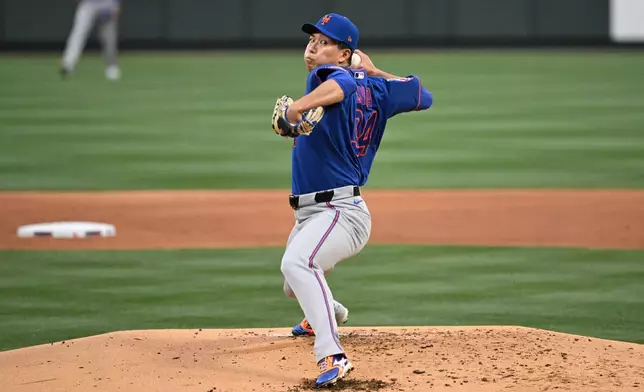 New York Mets starting pitcher Kodai Senga throws in the first inning of a baseball game against the St. Louis Cardinals, Tuesday, March 31, 2026, in St. Louis. (AP Photo/Joe Puetz)