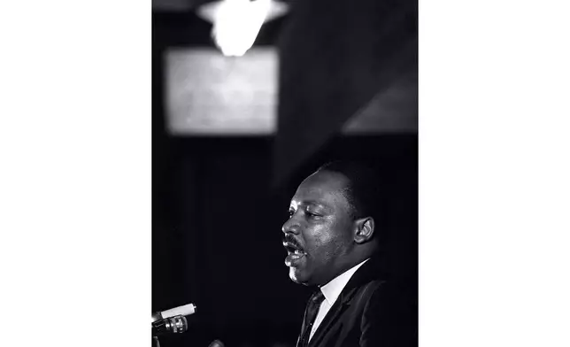 FILE - Dr. Martin Luther King Jr. makes his last public appearance at the Mason Temple in Memphis, Tenn., on April 3, 1968. (AP Photo/Charles Kelly, File)