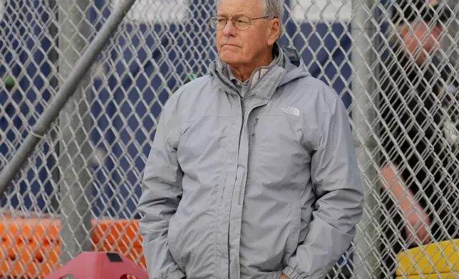 FILE - In this Feb. 9, 2019, file photo, Jim France, executive vice president of NASCAR, stands on pit road as he watches auto racing at Daytona International Speedway, in Daytona Beach, Fla.. (AP Photo/Terry Renna, File)