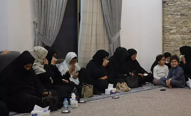 Women sit in quiet grief at the family home of Iraqi singer Sajida Obaid during the seventh-day mourning gathering in Irbil, Iraq, Thursday, April 10, 2026. (AP Photo/Stella Martany)