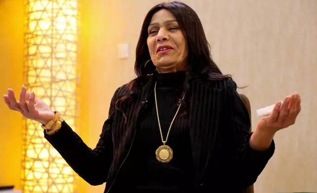 FILE - Singer Sajda Obeid speaks during an interview in Irbil, Iraq, Friday, Dec. 10, 2021. (AP Photo/Hussein Ibrahim, File)