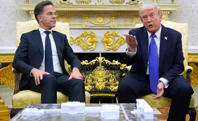 FILE - President Donald Trump meets with NATO Secretary General Mark Rutte in the Oval Office of the White House, Oct. 22, 2025, in Washington. (AP Photo/Alex Brandon, File)