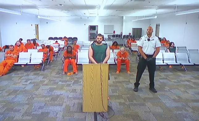 Hisham Abugharbieh, facing two counts of first-degree murder appears in court via video on Saturday, April 25, 2026 in Tampa, Fla. (WFTS-TV via AP)