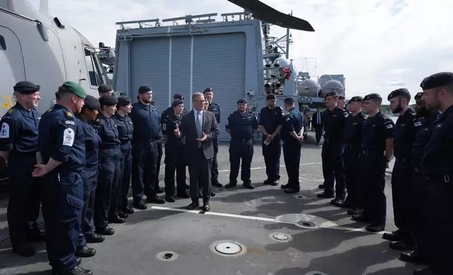 FILE - Britain's Prime Minister Keir Starmer speaks to Royal Marines onboard the HMS ST Albans in Oslo, during his visit to Norway on Friday, May 9, 2025.(AP Photo/Alastair Grant, Pool, File)