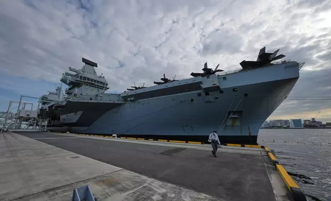 FILE - The Royal Navy aircraft carrier HMS Prince of Wales is pictured before its port call in Tokyo, Thursday, Aug. 28, 2025. (AP Photo/Eugene Hoshiko, File)