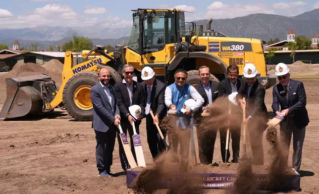 Officials break ground for the new Knight Riders Cricket Field, which will serve as the Los Angeles Knight Riders' official home field for 2026 and later host cricket at the LA 2028 Olympics, at the Pomona Fairplex in Pomona, Calif., on Wednesday, April 22, 2026. (AP Photo/Damian Dovarganes)
