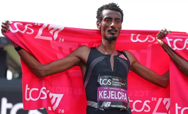 Yomif Keyelcha of Ethiopia celebrates after the men's race at the London Marathon in London, Sunday, April 26, 2026.(AP Photo/Ian Walton)