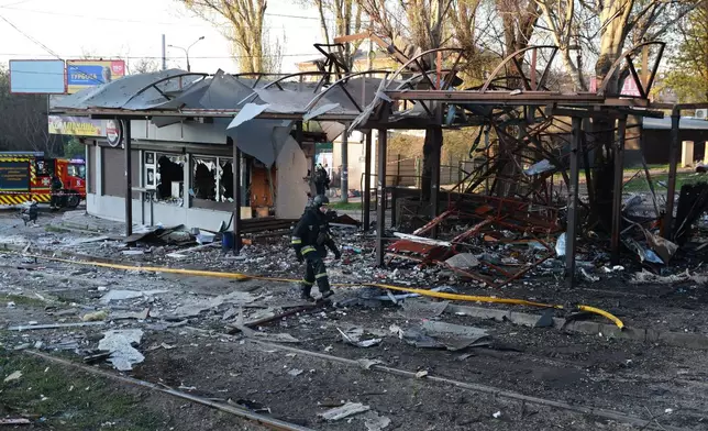 A public transport station destroyed by Russia's drone attack is seen in Zaporizhzhia, Ukraine, Wednesday, April 15, 2026. (AP Photo/Kateryna Klochko)