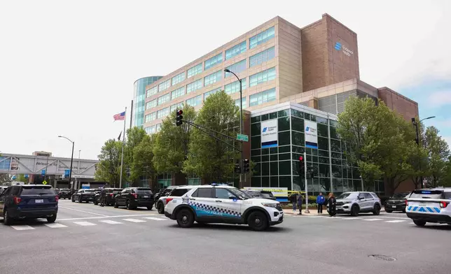 Police work the scene outside Endeavor Health Swedish Hospital in Lincoln Square, Saturday, April 25, 2026 in Chicago. (Anthony Vazquez/Chicago Sun-Times via AP)