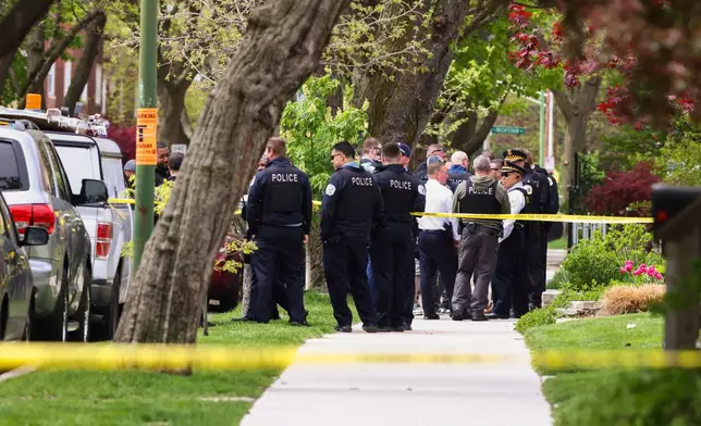 Police officers work the scene outside Endeavor Health Swedish Hospital in Lincoln Square, on Saturday, April 25, 2026. (Anthony Vazquez/Chicago Sun-Times via AP)