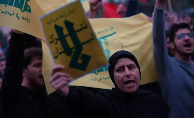 A Hezbollah supporter shouts slogans during a protest against the Lebanese Prime Minister Nawaf Salam, in front the government palace in Beirut, Lebanon, Friday, April 10, 2026. (AP Photo/Emilio Morenatti)