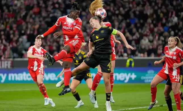 Bayern's Glodis Viggosdottir, centre rear, scores her sides first goal during the Women's Champions League quarterfinal second leg soccer match between Bayern Munich and Manchester United in Munich, Germany, Wednesday, April 1, 2026. (AP Photo/Matthias Schrader)