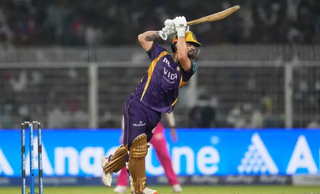 Kolkata Knight Riders' Rinku Singh plays a shot during the Indian Premier League cricket match between Kolkata Knight Riders and Rajasthan Royals in Kolkata, India, Sunday, April 19, 2026. (AP Photo/Bikas Das)