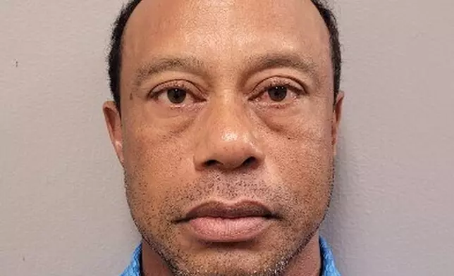 This handout photo provided by the Martin County Sheriff's Office shows Tiger Woods, in Stuart, Fla., Friday, March 27, 2026. (Martin County Sheriff's Office via AP)